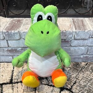 Large Yoshi Stuffie with pocket for small treasures!